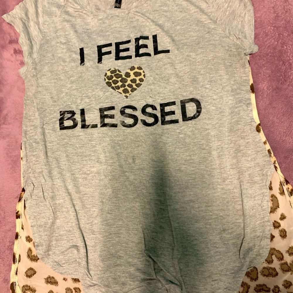 Stretchy animal print blouse. Cute message